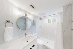 Shower, hair dryer, towels, soap