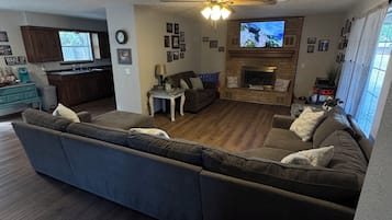 Smart TV, fireplace, books