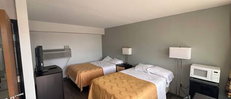 Desk, laptop workspace, blackout curtains, free WiFi