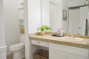 Shower, towels, soap, toilet paper