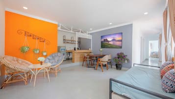 Family Apartment, Lake View | Living area | TV