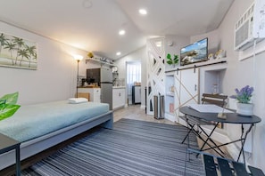 Desk, iron/ironing board, travel cot, free WiFi