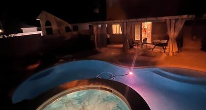 CLEAN, COMFORTABLE 4bedroom house with POOL & JACUZZI,GAMEROOM near Everything!