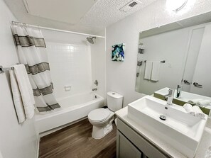 Hair dryer, towels, soap, shampoo