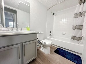 Hair dryer, towels, soap, shampoo