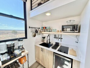Coffee/tea maker, fridge, microwave, oven