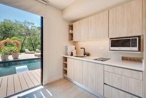 Fridge, microwave, stovetop, coffee/tea maker