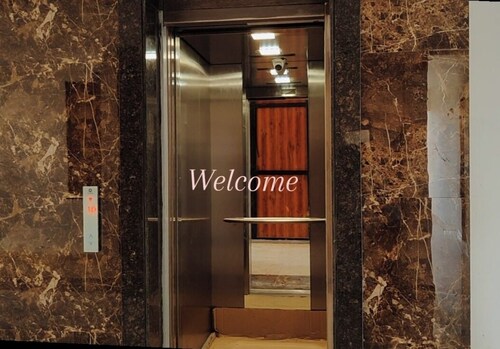 Jigyasa Comfy Studio in Vrindavan near Bankebihari Prem Mandir AC Balcony kitchn