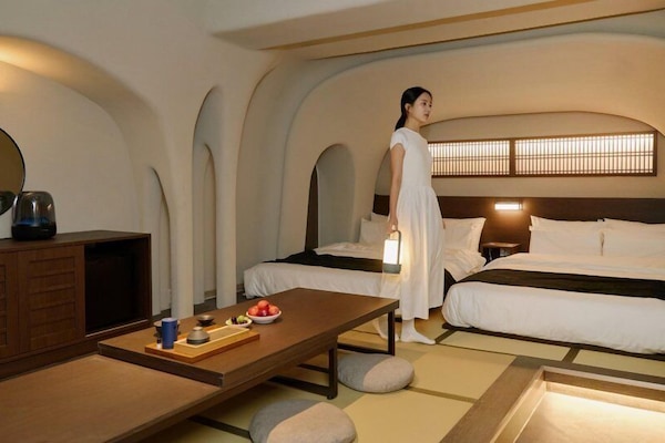 Cavern Room | Blackout drapes, soundproofing, free WiFi, bed sheets