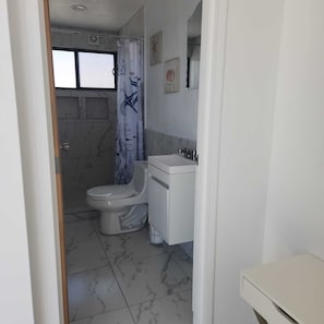 Hair dryer, towels, soap, toilet paper
