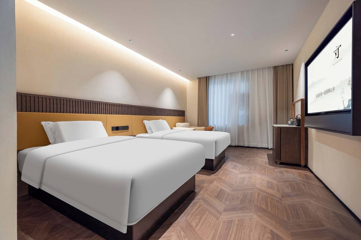 ห้องคลาสสิกทวิน | เครื่องนอนระดับพรีเมียม, ผ้านวมขนเป็ด, มินิบาร์ฟรี, ผ้าม่านกันแสง