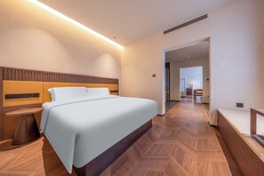 Premium bedding, down comforters, free minibar, individually decorated