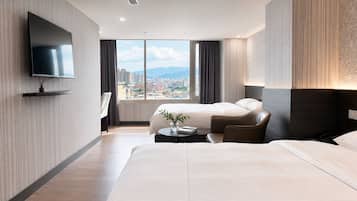 Superior Quadruple Room | Down comforters, minibar (free items), desk, blackout drapes