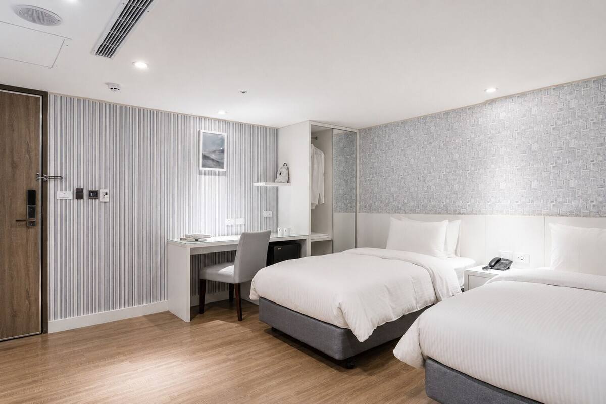 Standard Twin Room | Down comforters, minibar (free items), desk, blackout drapes
