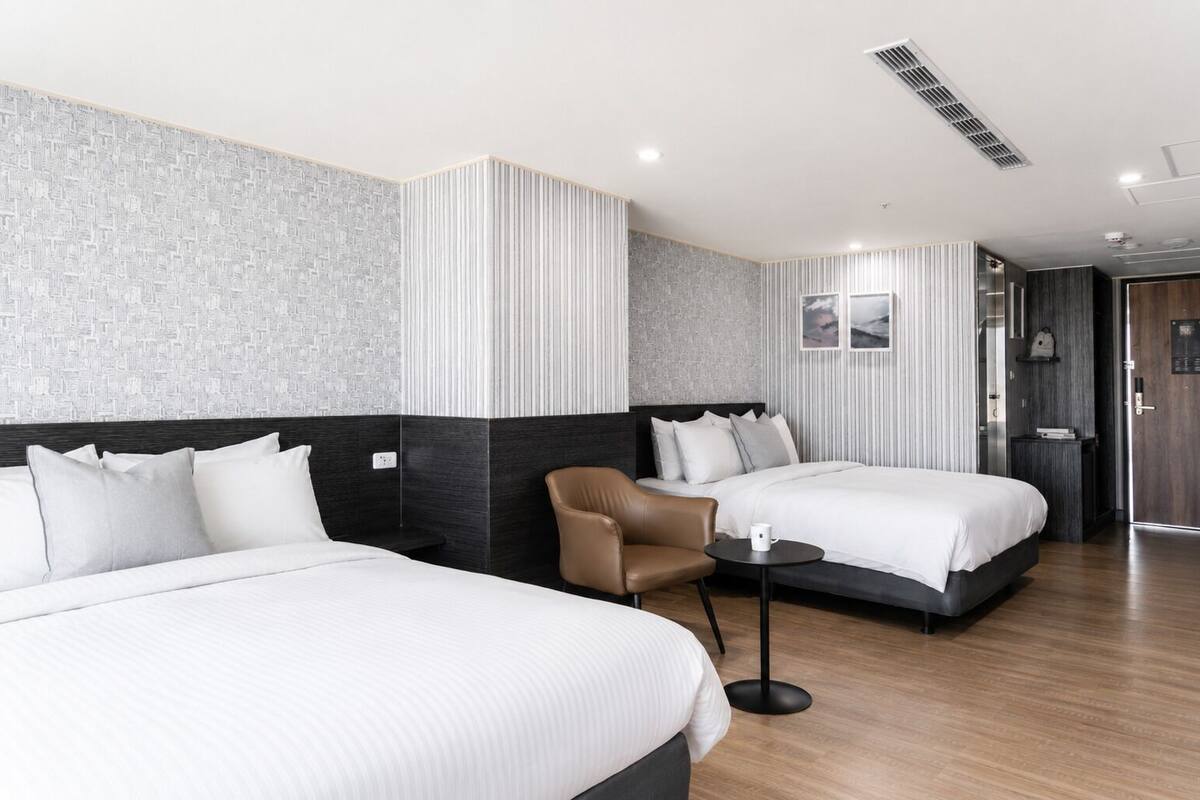 Standard Quadruple Room | Down comforters, minibar (free items), desk, blackout drapes