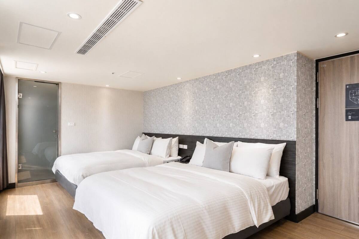 Superior Quadruple Room | Down comforters, minibar (free items), desk, blackout drapes