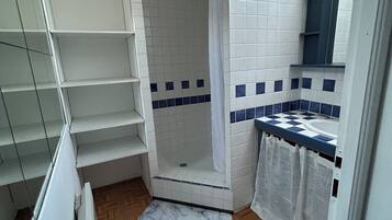 Shower, towels, soap, toilet paper