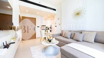 Coffres-forts dans les chambres, fer et planche à repasser