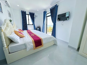 Habitación cuádruple junior | Wifi gratis y ropa de cama