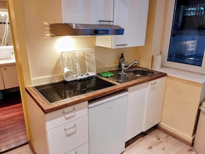 Fridge, microwave, stovetop, coffee/tea maker