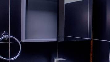 Departamento, vista al jardín | Baño