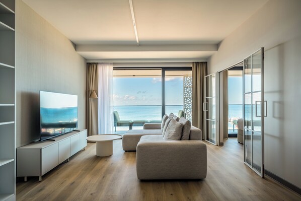 Suite, Sea View | In-room safe, individually decorated, individually furnished, desk