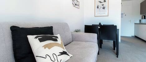 Classic Studio, Balcony | Living area | 32-inch flat-screen TV with digital channels