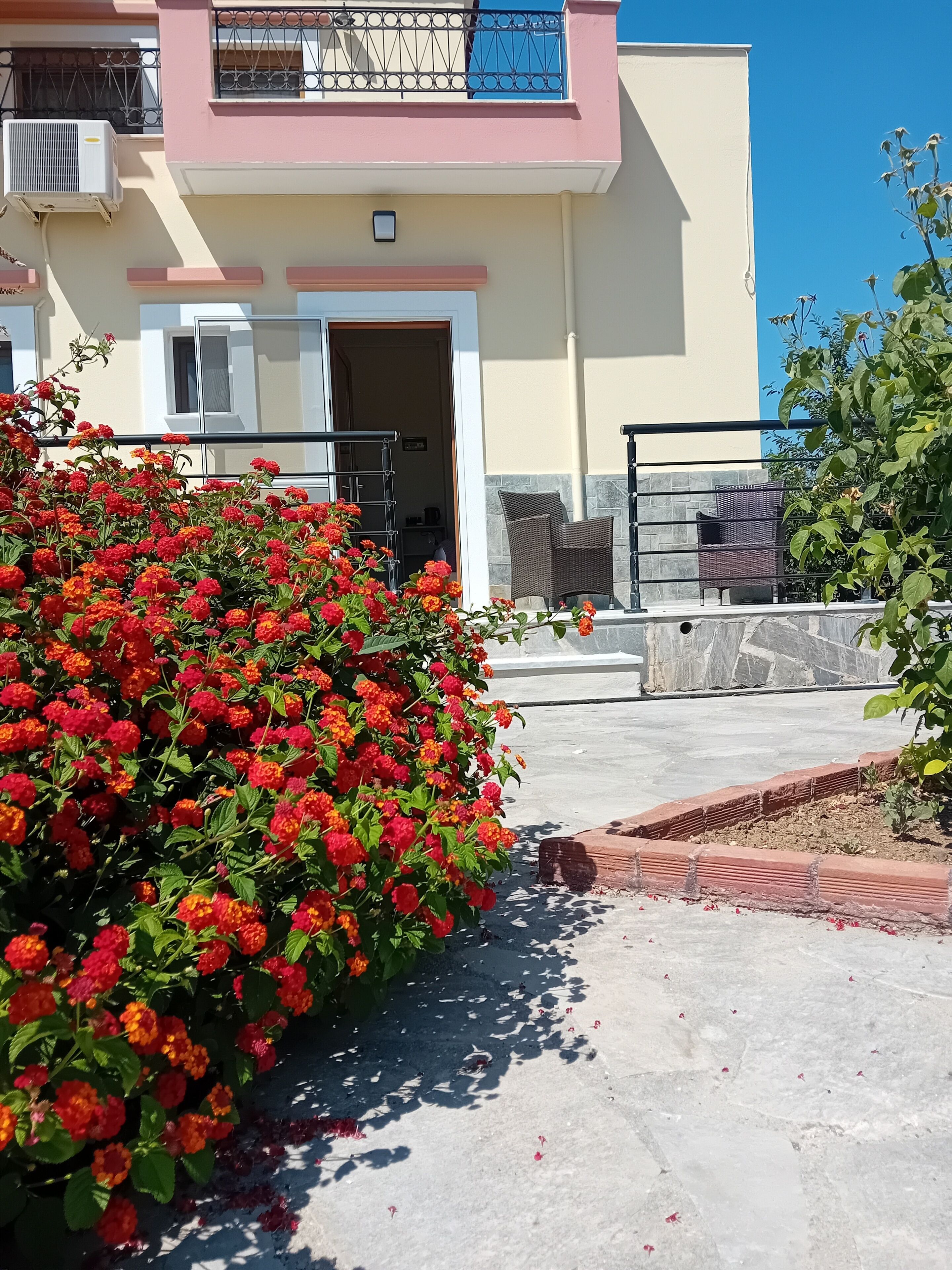 Chambre Deluxe Double ou avec lits jumeaux, vue partielle sur l'océan | Terrasse/Patio