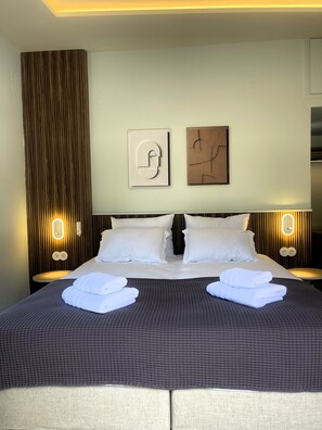 Superior Quadruple Room, Garden View | In-room safe, blackout drapes, soundproofing, iron/ironing board