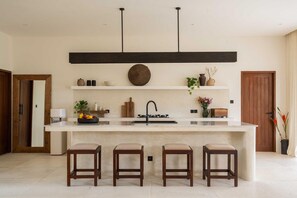 Fridge, stovetop, coffee/tea maker, blender