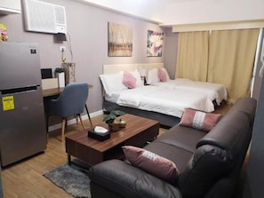 Desk, laptop workspace, blackout curtains, free WiFi