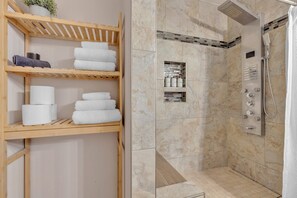 Shower, eco-friendly toiletries, hair dryer, towels