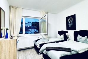 2 chambres, fer et planche Ă repasser, draps fournis