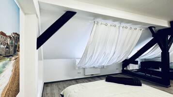 2 slaapkamers, een strijkplank/strijkijzer, beddengoed