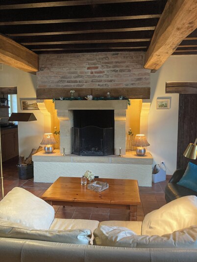 Spacious gîte in idyllic wooded setting by a stream with hammock & barbecue