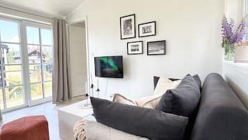 Standard Chalet, Hill View | Living area | 32-inch Smart TV with digital channels
