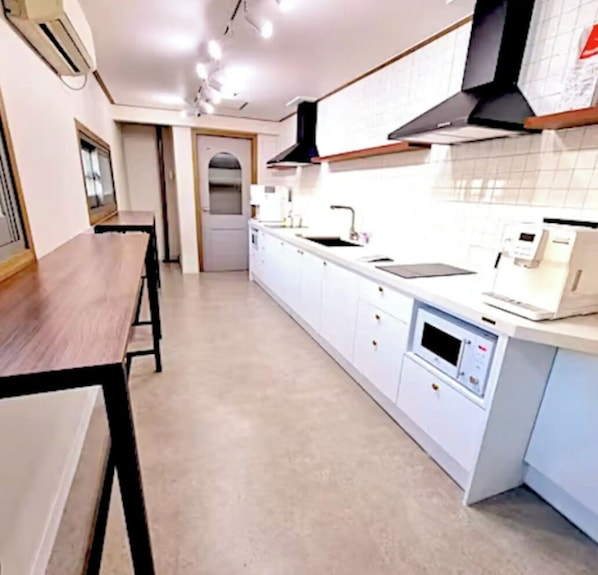 Fridge, microwave, stovetop, coffee/tea maker