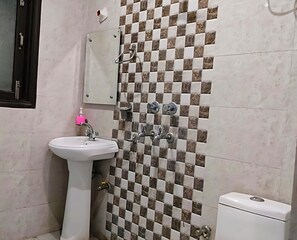 Ducha, toallas, jabón, shampoo