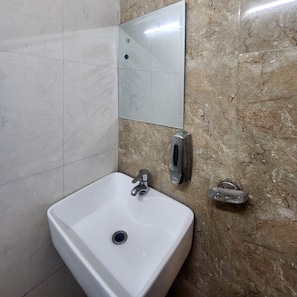 Shower, towels, soap, shampoo