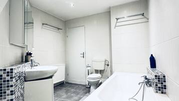 Hair dryer, bidet, towels, soap