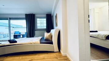 2 slaapkamers, een strijkplank/strijkijzer, beddengoed