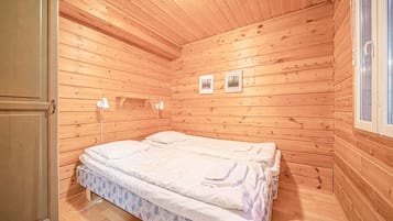 Tabla de planchar con plancha, wifi gratis y ropa de cama
