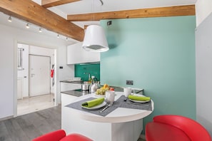 Familieleilighet, flere soverom (Riva's Rooftop Retreat) | Spiseområde