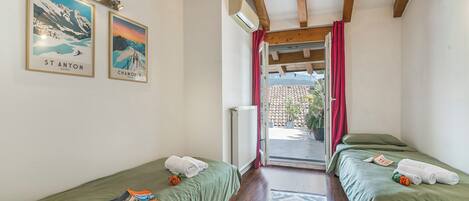 Family Apartment, Multiple Bedrooms (Riva's Rooftop Retreat) | 2 bedrooms, free WiFi, bed sheets