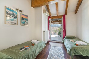 Family Apartment, Multiple Bedrooms (Riva's Rooftop Retreat) | 2 bedrooms, free WiFi, bed sheets