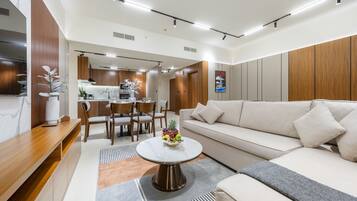 Luxury Apartment, 2 Bedrooms, Non Smoking, Sea View | Living area | 55-inch Smart TV with cable channels