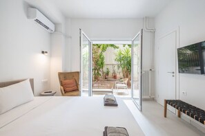 1 slaapkamer, een strijkplank/strijkijzer, wifi, beddengoed