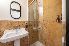 Shower, towels, soap, shampoo