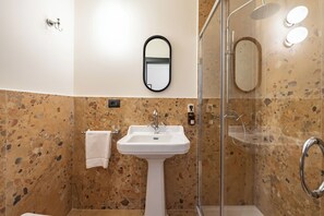 Shower, towels, soap, shampoo