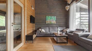 Classic Chalet, Courtyard View | Living area | 40-inch flat-screen TV with cable channels